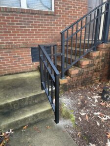 Industrial catwalk with safety handrail at tank farm