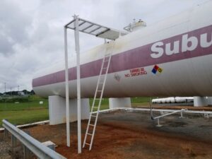 Custom steel access ladder and platform on industrial tank